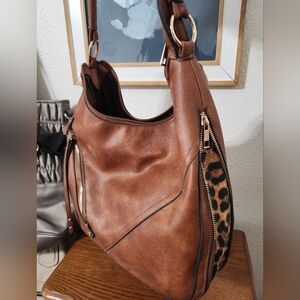 Beautiful Brown/Leopard Print on Sides, Shoulder Bag.  In Excellent condition.
